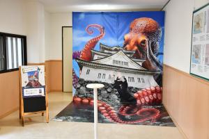 タコがお城を覆っているフォトスポット